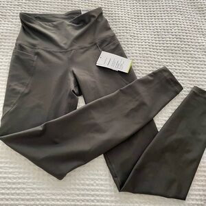 Khaki leggings with side pockets